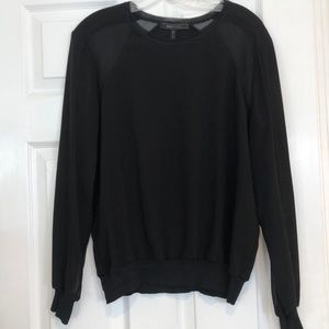 BCBG top with sheer panels on sleeves